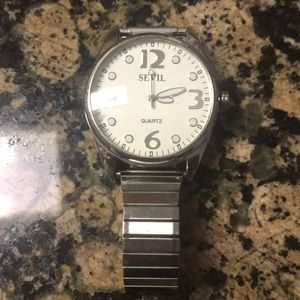 Sevil quartz crystal watch